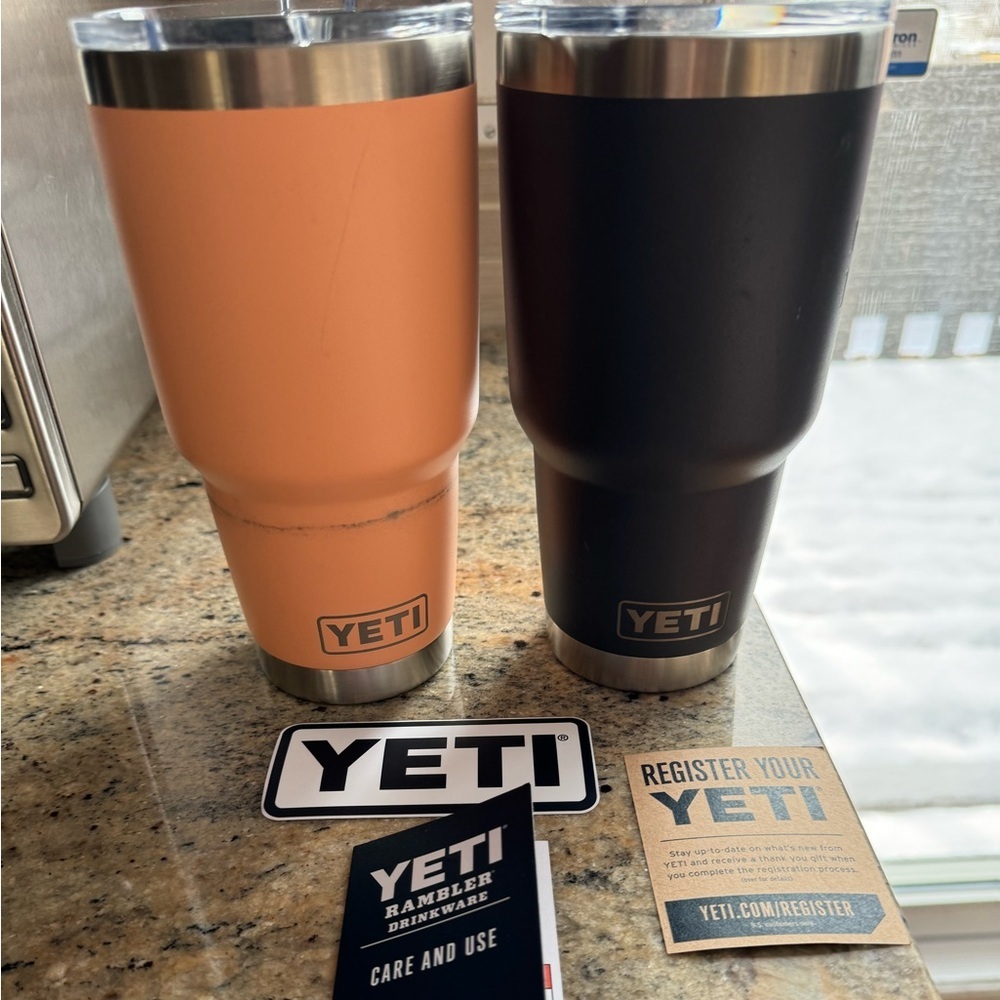 YETI NWT tumblers X2 with company logos. Back to school